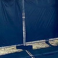 67bb74f84ad8f50a1d63803d_Mobilzaun_schwarz_verplant_Bauzaun_Festivalzaun-min